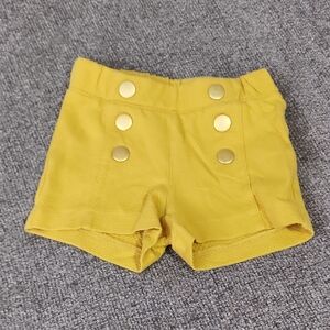 Yellow Shorts with Gold Buttons